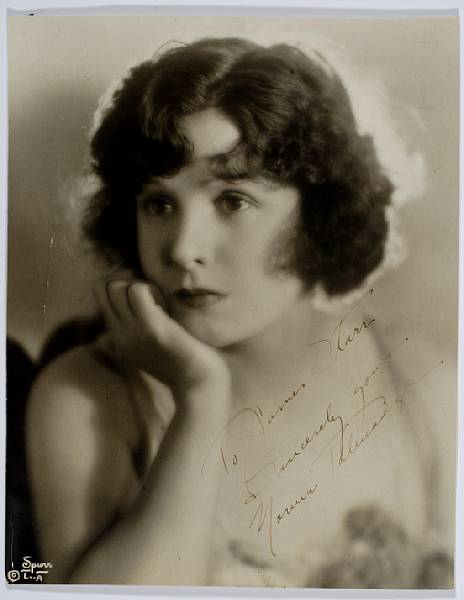 Appraisal: A Norma Talmadge signed sepia photograph by Melbourne Spurr s