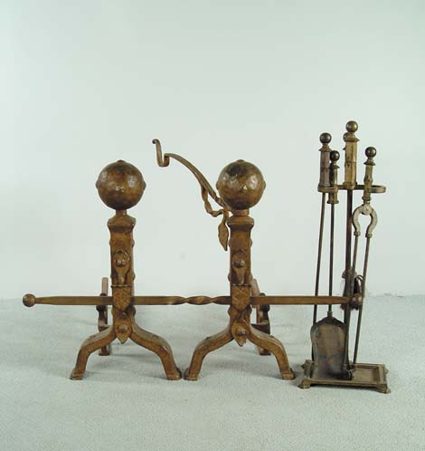 Appraisal: OUTSTANDING FIREPLACE SET Large ball top Mission style andirons have