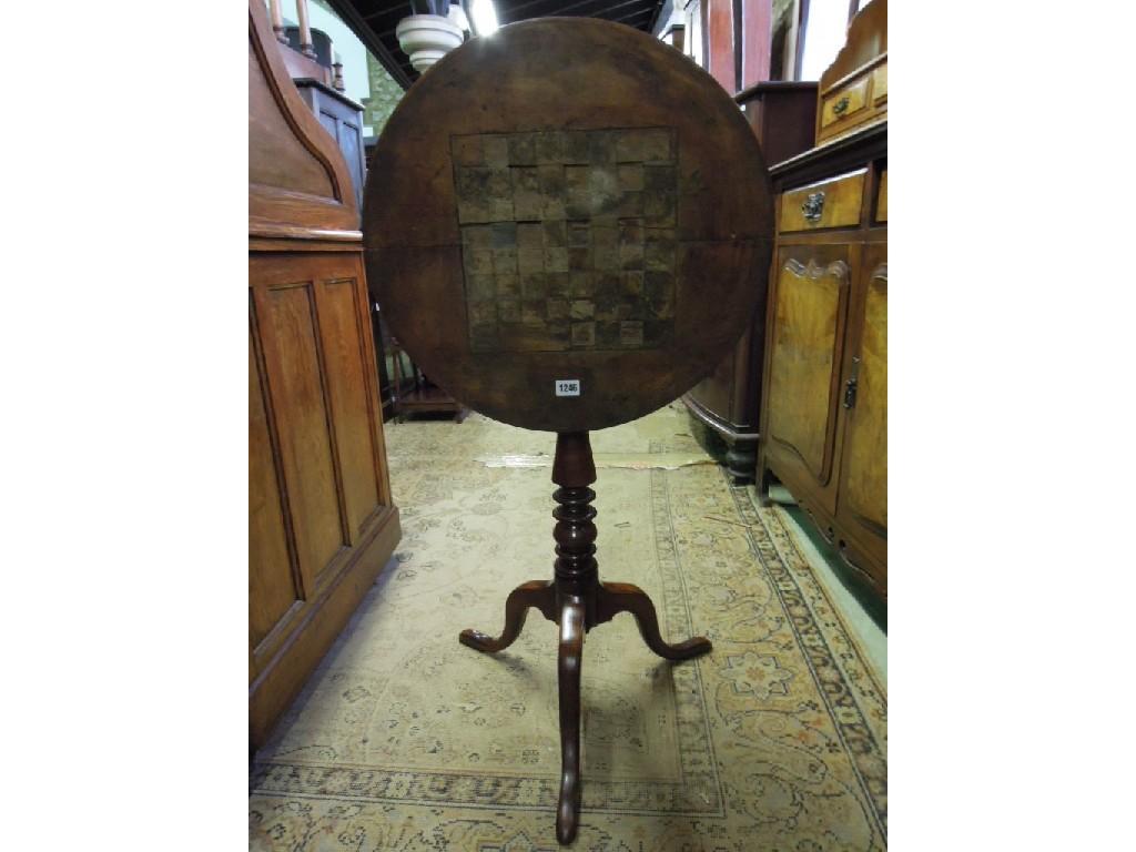 Appraisal: A Victorian mahogany snap top occasional table of circular form