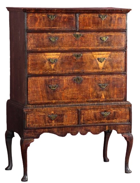 Appraisal: A George I oak veneered chest on stand the moulded