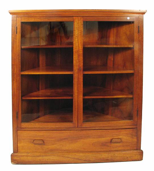 Appraisal: An American koa wood corner cupboard height ft in width