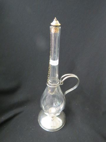 Appraisal: Sterling Silver and Cut Glass Decanter handled snake wrap tal