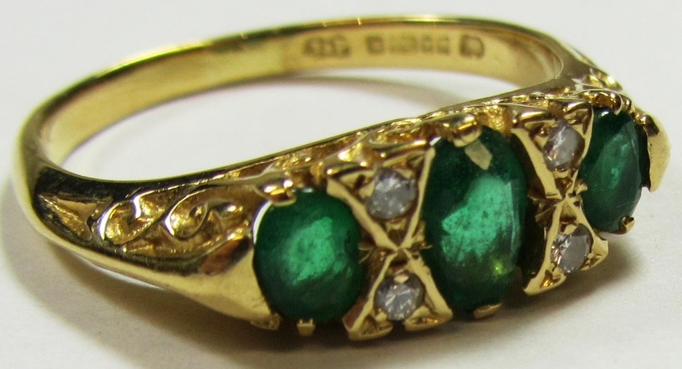 Appraisal: An ct gold emerald and diamond set ring mounted with