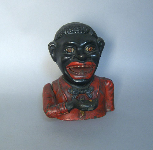 Appraisal: Cast iron jolly black man bank late th c h