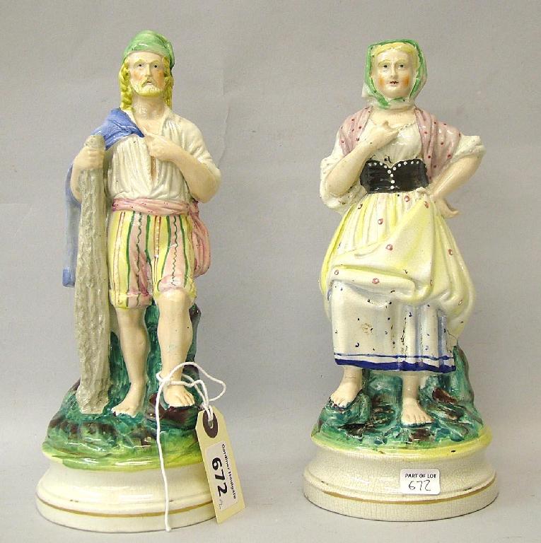 Appraisal: Pair of Staffordshire standing peasant figures supported upon circular rocky