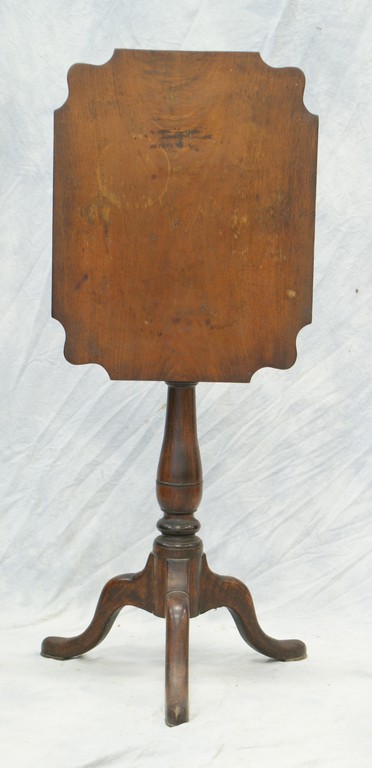 Appraisal: Walnut birdcage supported tilt top candlestand rect top with shaped