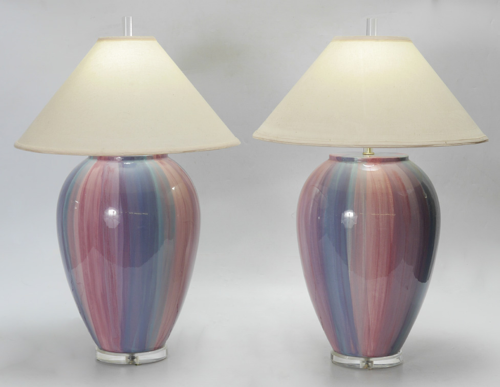 Appraisal: PAIR 'S POTTERY AND LUCITE LAMPS Lucite base pottery bodies