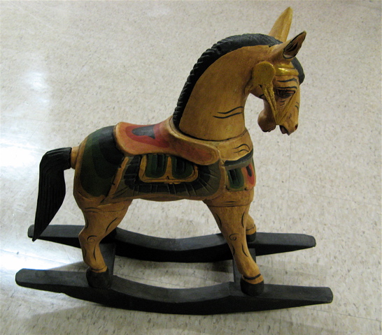 Appraisal: TWO EQUESTRIAN WOOD SCULPTURES large carousel style horse in walking