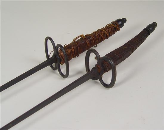 Appraisal: Two th Century German Swords One is a rapier with