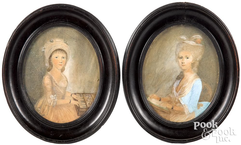 Appraisal: Pair of oval pencil and watercolor portraits Pair of oval