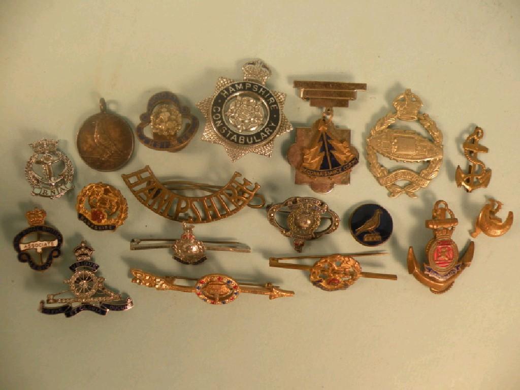 Appraisal: Various military cap badges medals pins etc relating to the