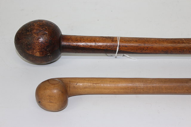 Appraisal: A HARDWOOD TURNED KNOB KERRY together with a further walking