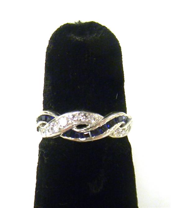 Appraisal: JEWELRY Diamond and sapphire band ring set with ten dark