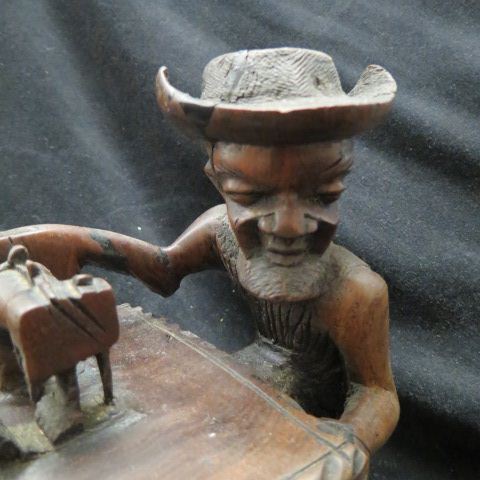 Appraisal: Folk Art Carved Wooden Figurine of an Old Manat a