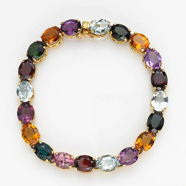 Appraisal: A gem-set and eighteen karat gold bracelet comprising tourmaline citrine