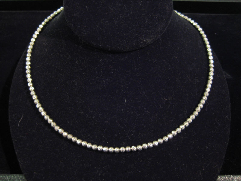 Appraisal: BEAD NECKLACE k white gold diamond cut bead necklace Weight