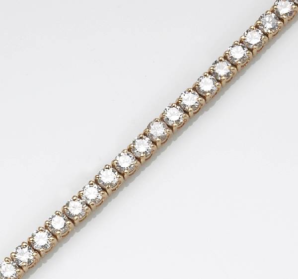 Appraisal: A diamond and k gold bracelet estimated total diamond weight