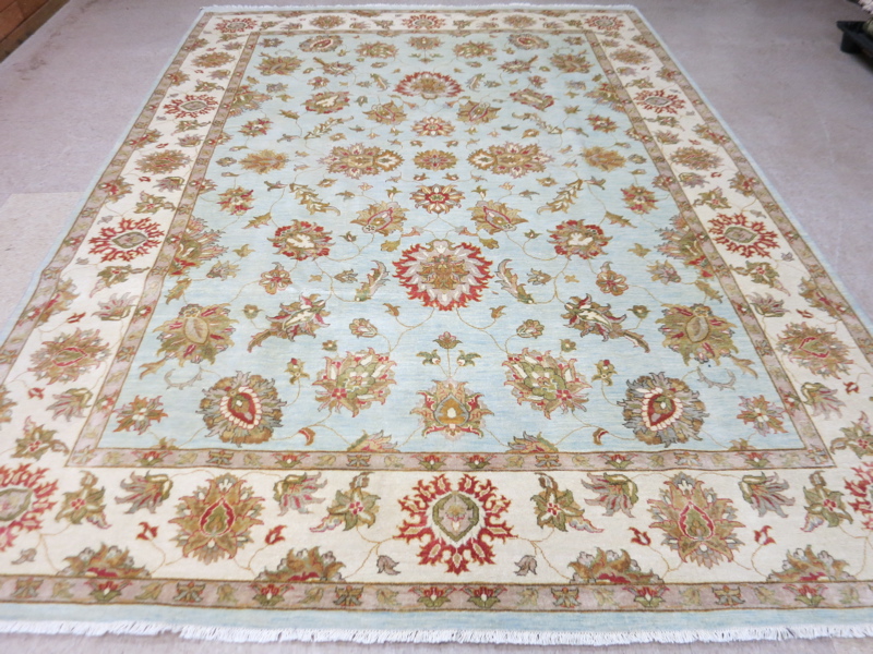 Appraisal: HAND KNOTTED ORIENTAL CARPET Persian Isfahan design on light blue