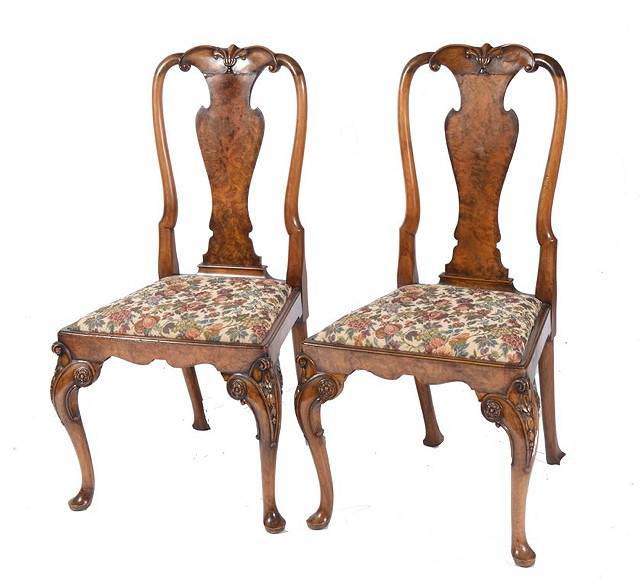 Appraisal: A PAIR OF QUEEN ANNE STYLE WALUT DINING CHAIRS with