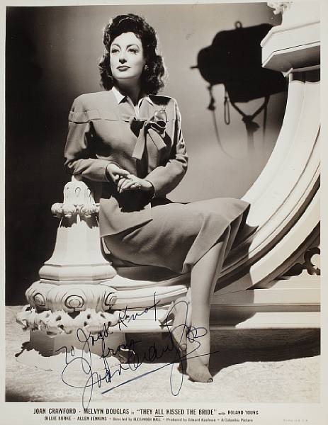 Appraisal: A Joan Crawford signed black and white photograph s A