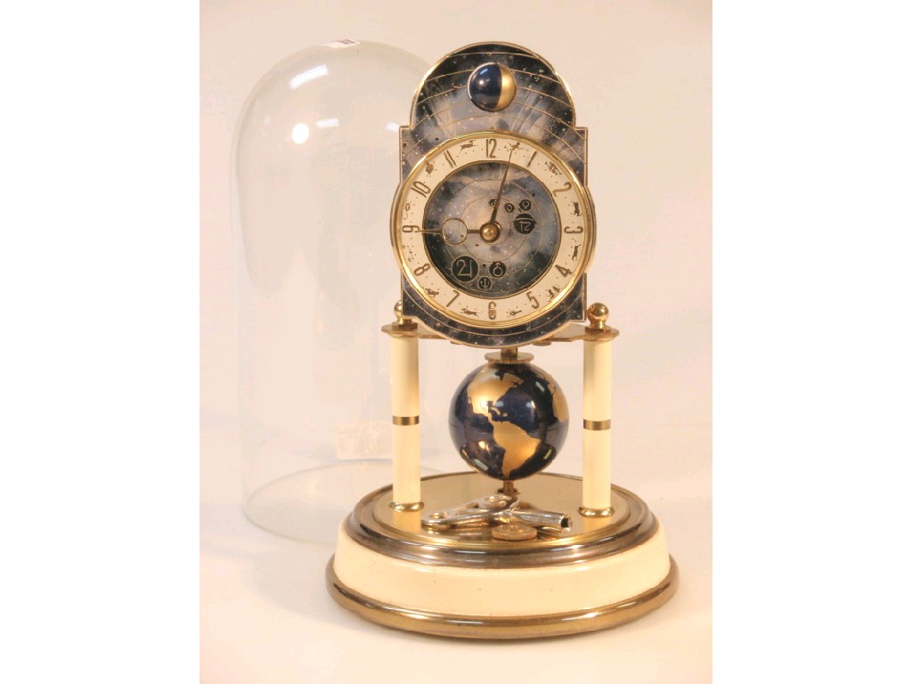 Appraisal: A Kaiser day clock with Arabic dial with zodiac symbols