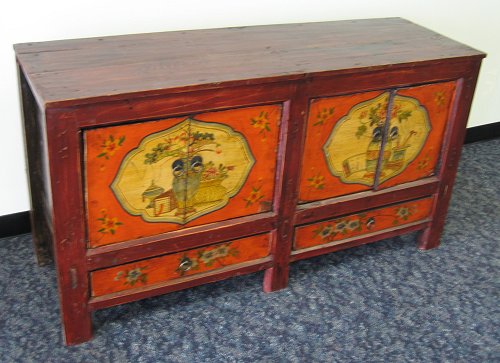 Appraisal: CHINESE MONGOLIAN PAINT DECORATED LOW CABINET doors over drawers Measures