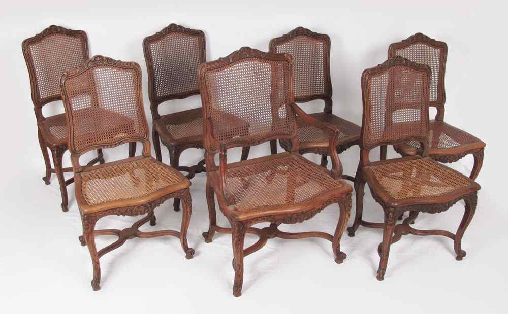 Appraisal: SET OF CARVED CANED DINING CHAIRS Carved backs and legs