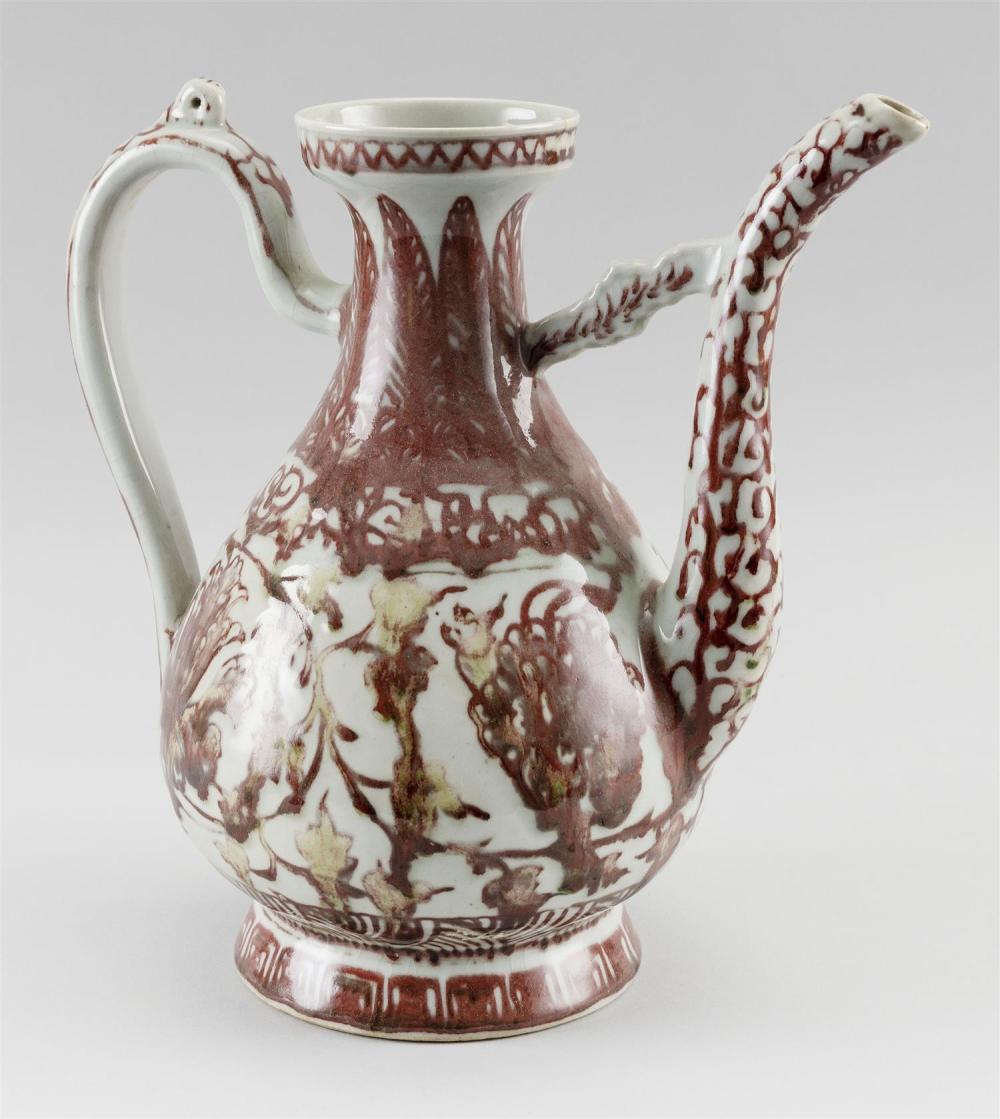 Appraisal: CHINESE FLAMB RED AND WHITE PORCELAIN EWER th Century Lotus