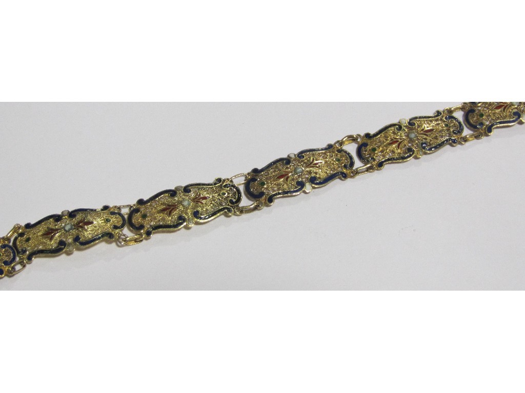 Appraisal: A yellow metal and enamel filigree work bracelet made up