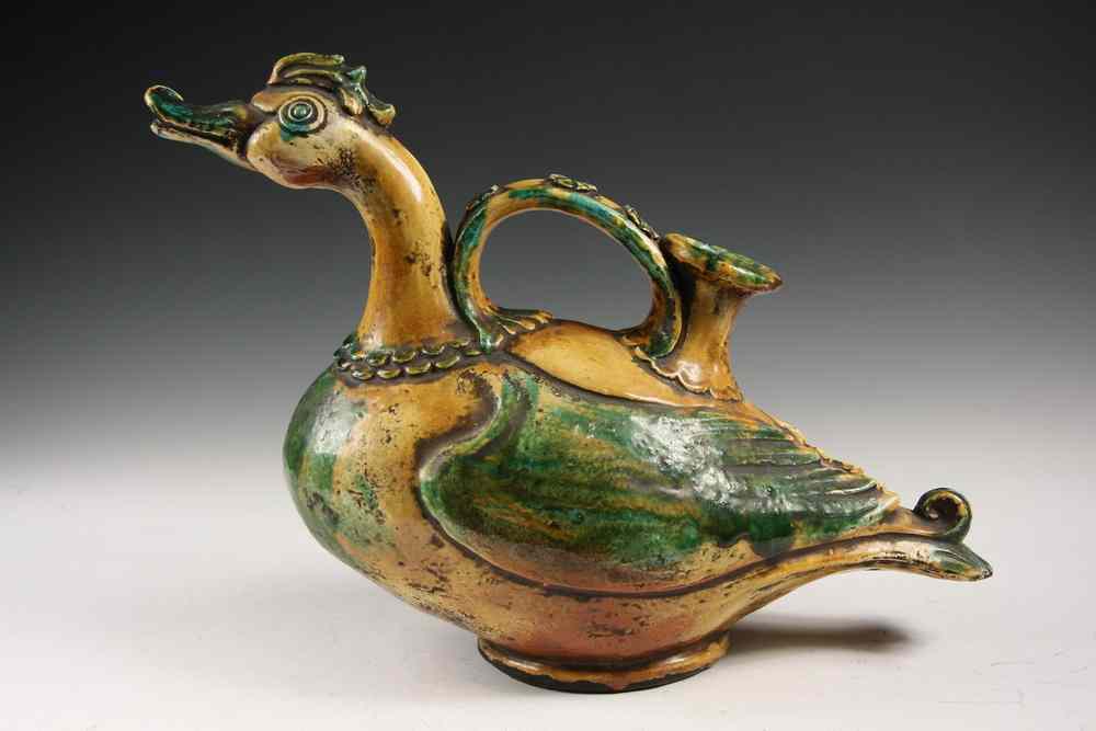 Appraisal: CHINESE POTTERY JUG - Ming Period Sancai Glazed Goose Form