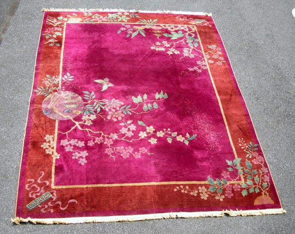 Appraisal: Chinese room size rug circa having purple field with circle