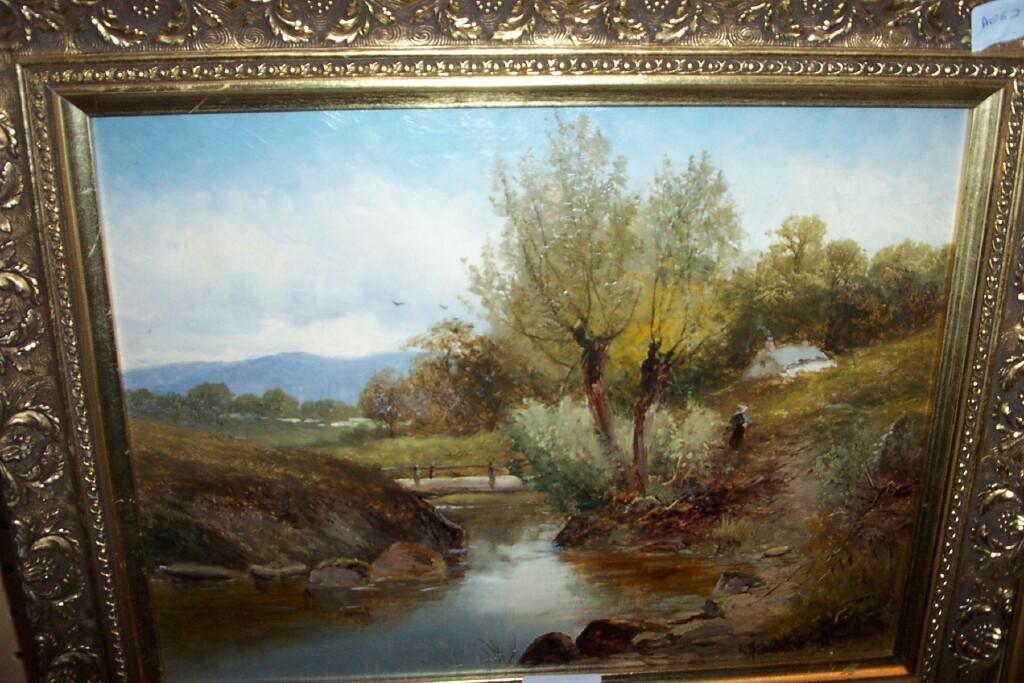 Appraisal: A th century oil painting on board of country landscape