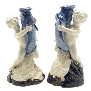 Appraisal: Pair of Royal Worcester Porcelain Figures of Cupid As Fisherman