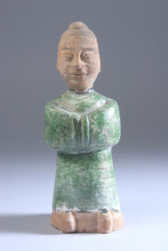 Appraisal: CHINESE GREEN GLAZED POTTERY FIGURE OF MAN Han dynasty -