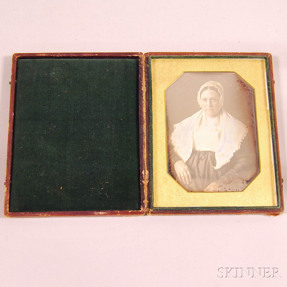 Appraisal: Half-plate Daguerreotype Portrait of a Woman the woman seated wearing