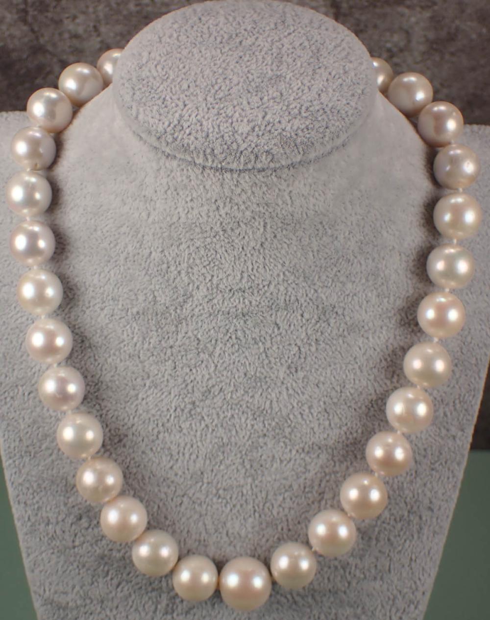 Appraisal: SOUTH SEA PEARL AND EIGHTEEN KARAT GOLD NECKLACE - hand-knotted