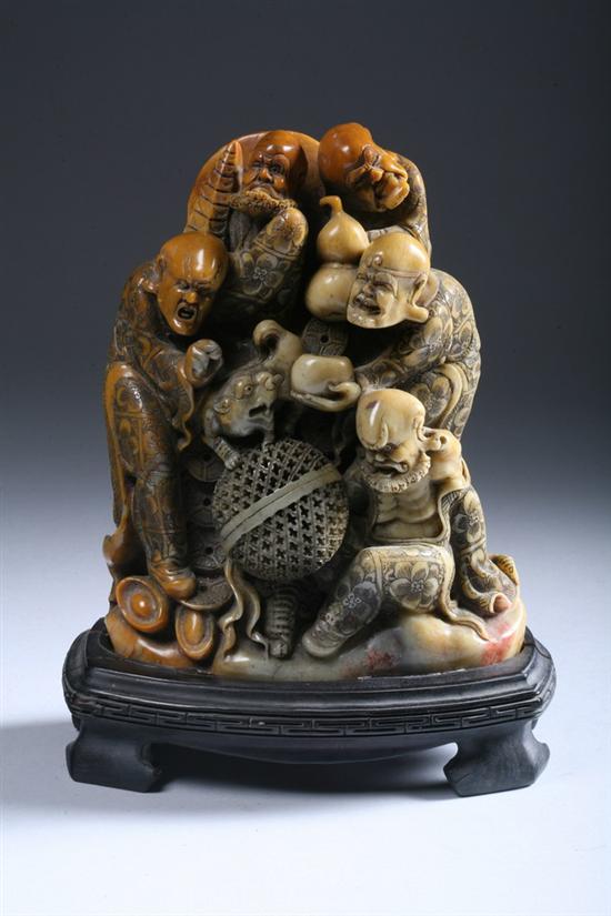 Appraisal: CHINESE SOAPSTONE FIGURAL GROUP late Qing Dynasty Lohan and qilin