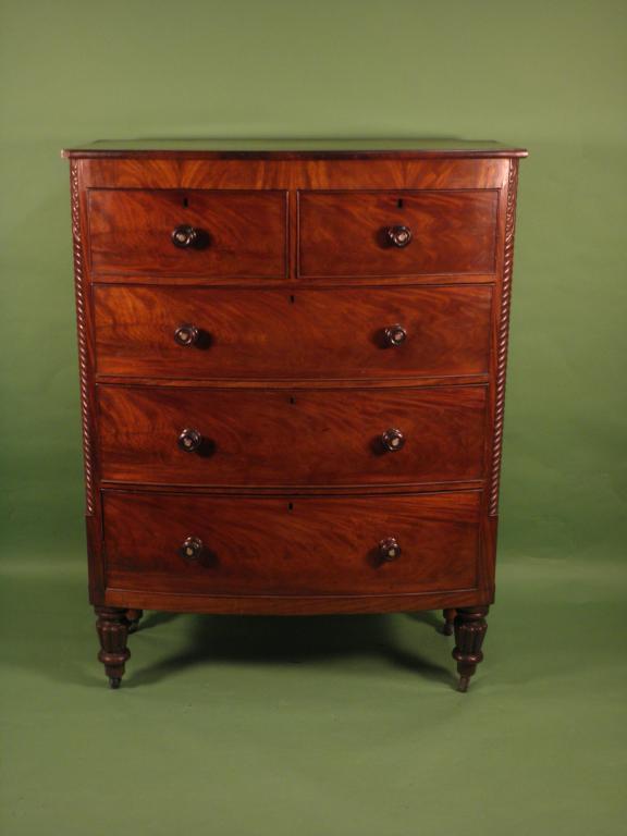 Appraisal: An Victorian mahogany bow front chest of two short and