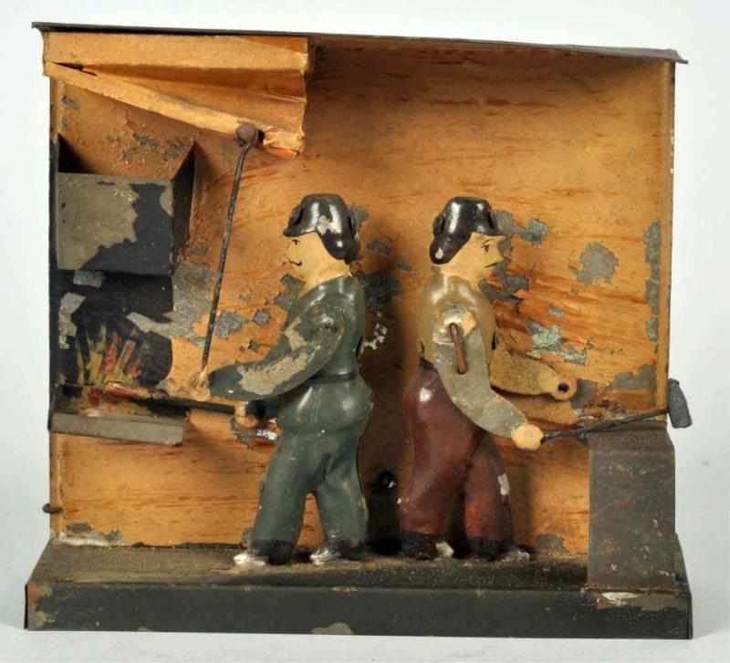 Appraisal: Handpainted Tin Steam Accessory Toy German Toy depicts two men