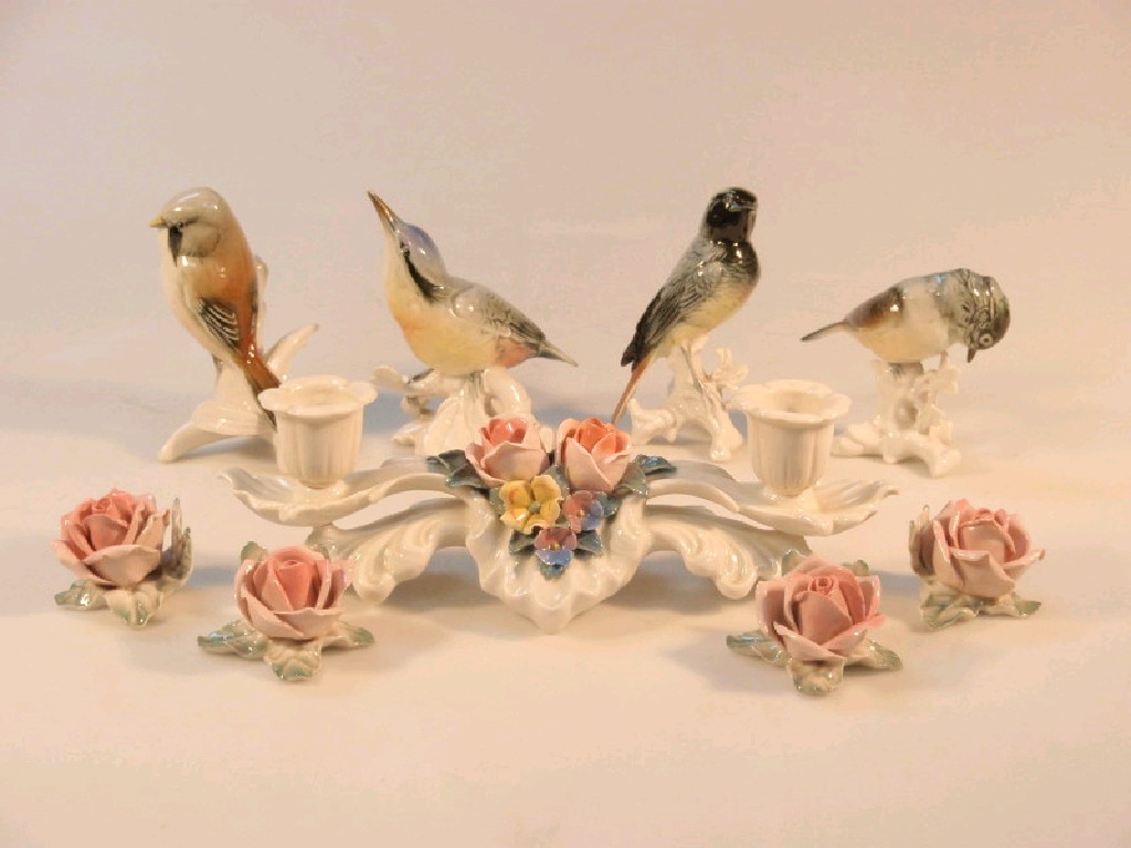 Appraisal: A group of four German porcelain birds various together with