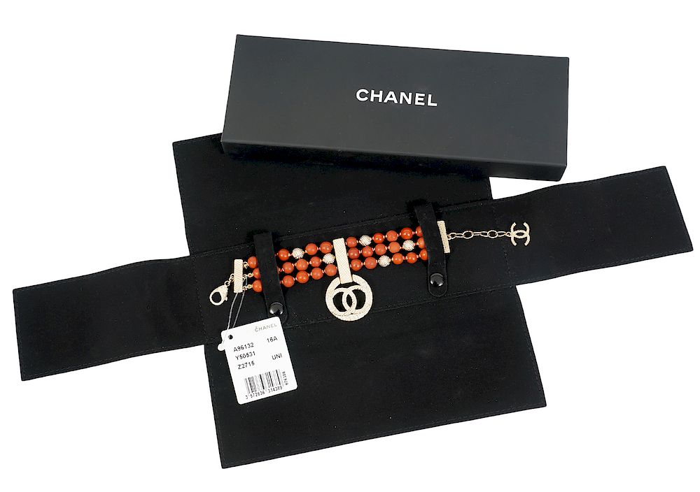 Appraisal: Chanel Strand Red Gold Tone Beads CC Charm This bracelet