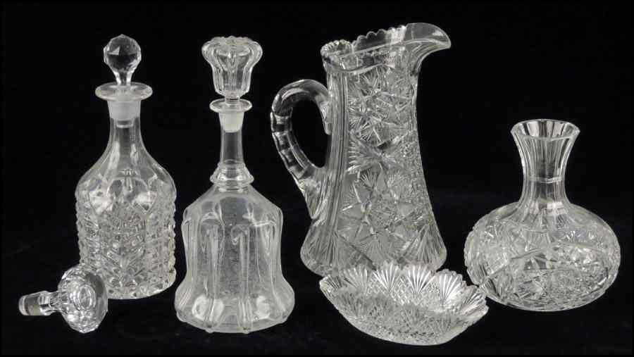 Appraisal: BRILLIANT CUT GLASS CARAFE Together with two decanters a brilliant