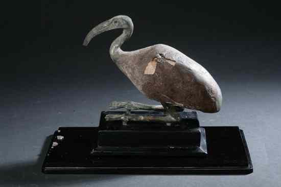 Appraisal: EGYPTIAN BRONZE AND WOOD FIGURE OF IBIS Late period to