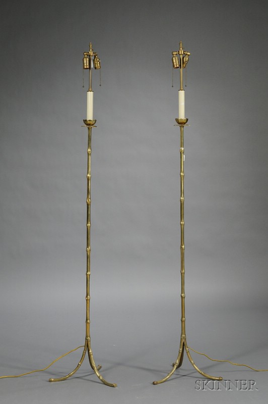 Appraisal: Three Two-light Floor Lamps modern comprising a faux bamboo brass