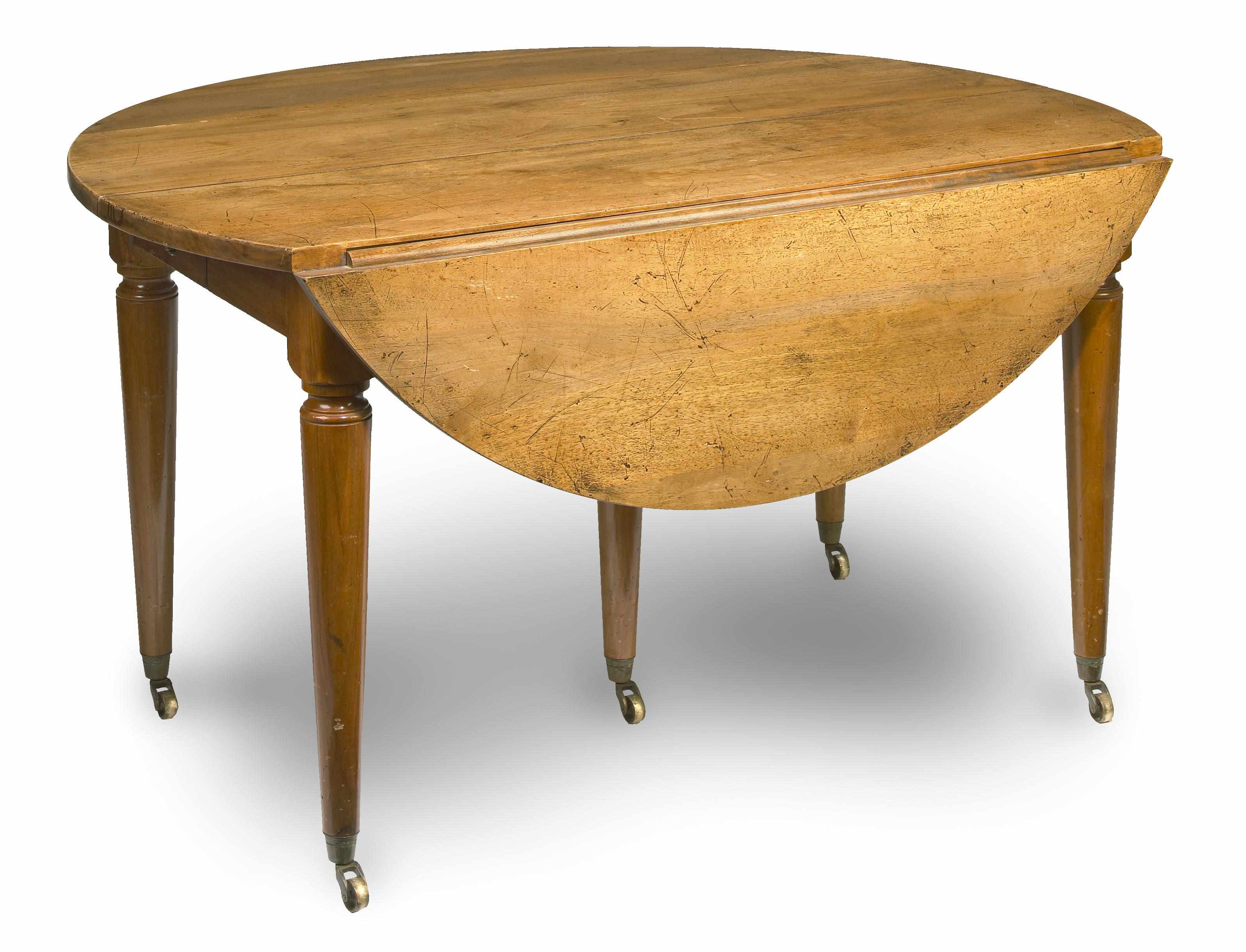 Appraisal: A Louis XVI style walnut drop flap extension dining table