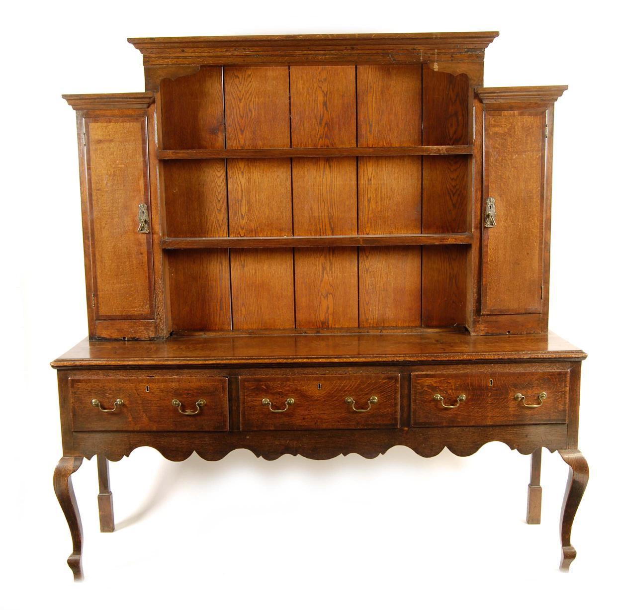 Appraisal: A late George III oak and mahogany crossbanded dresser