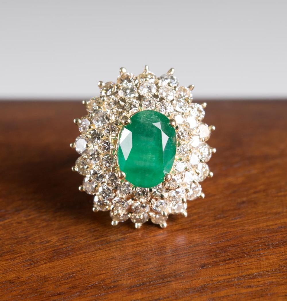 Appraisal: EMERALD DIAMOND AND FOURTEEN KARAT GOLD RING with a large