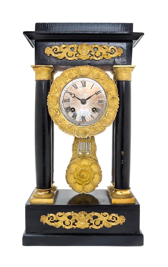 Appraisal: Sale Lot An Empire Gilt Metal Mounted Ebonized Portico Clock