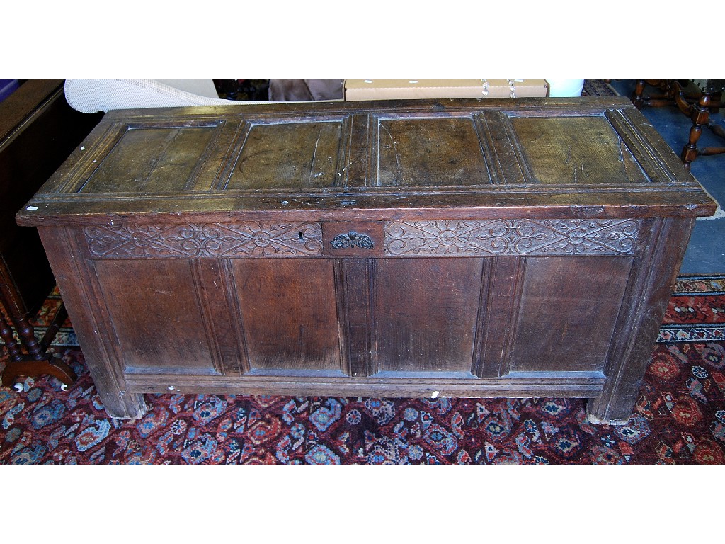 Appraisal: A large th century panelled oak jointed coffer the four