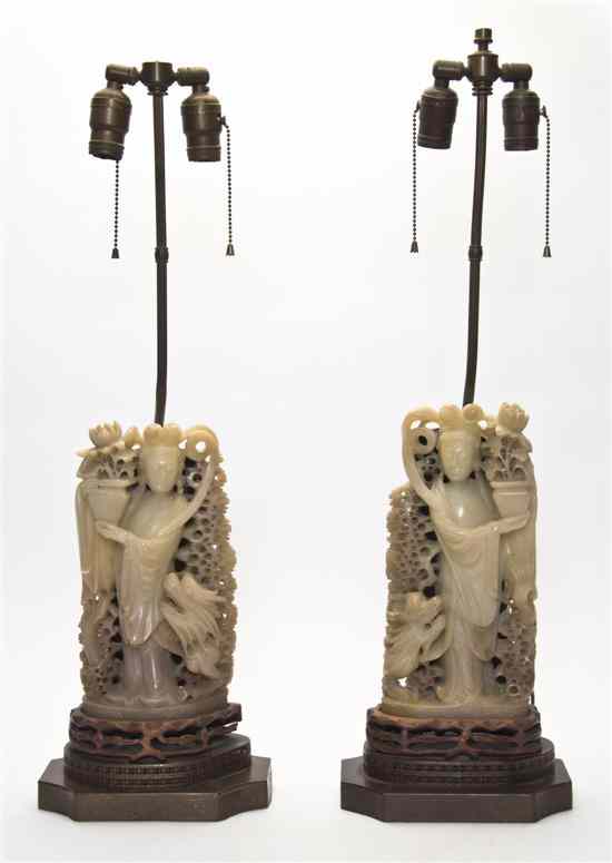 Appraisal: A Pair of Carved Soapstone Figures each depicting a woman